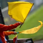 Yellow flag case, the guidelines are clear: drivers were not required to slow down