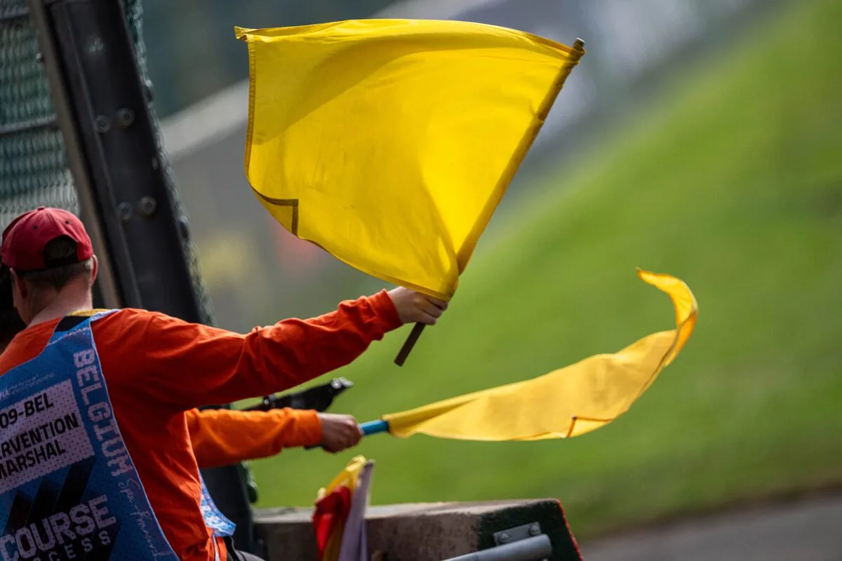 Yellow flag case, the guidelines are clear: drivers were not required to slow down